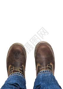 Menrsqopos棕色靴子和蓝牛仔裤孤立在白色露地上的Menrschoos棕色靴子和孤立的蓝色牛仔裤亚洲人男图片