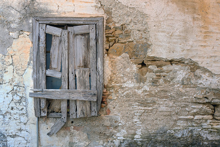 古董希腊萨莫斯岛纳拉特的旧石膏墙和窗户木制的镇图片