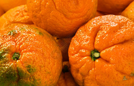 分割橙子水果关闭有选择焦点是果汁番茄酱健康的柑橘水果皮肤季节图片