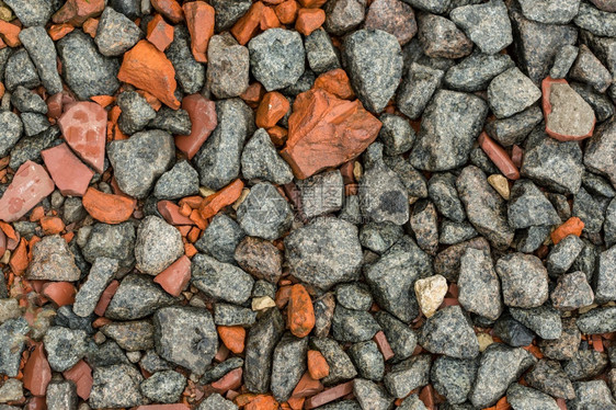 粗糙的复古粉碎石作为背景灰色红的粉碎石作为背景优质的图片