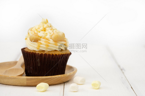 自动对焦Cupcake饼的装饰美极了光亮明AF点选择庆典桌子图片