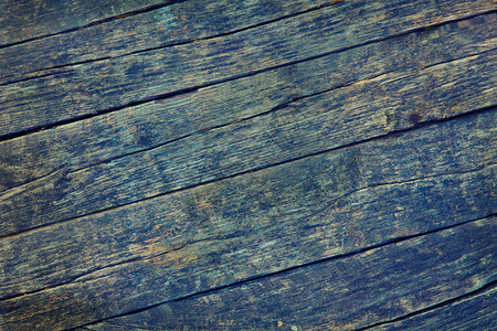 旧肮脏蓝和黄色对角板的一部分绿地面垃圾摇滚图片