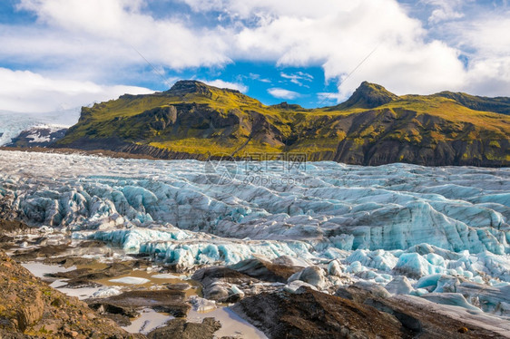 冰岛瓦特纳公园的斯维纳费尔冰川风景优美山蓝色的图片