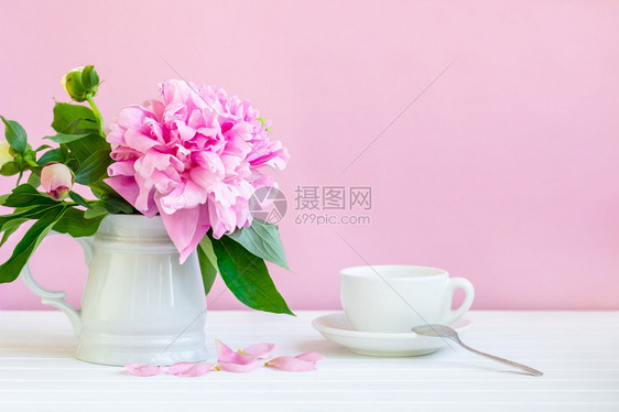 喝生活一杯茶和花瓶里的小松饼一杯茶和小松饼花瓣图片