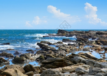 网户外热带岩石海滩包括椰子棕榈树沙滩和海洋Tangalle岛斯里兰卡南部省亚洲美丽的图片