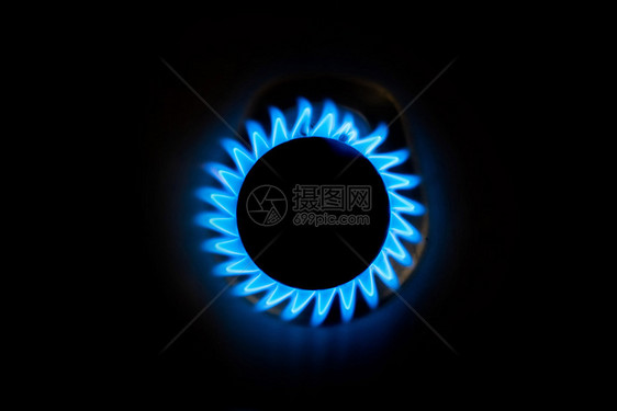 温暖的在家中黑背景上燃烧蓝色火焰的天然气家庭国内的刻录机图片