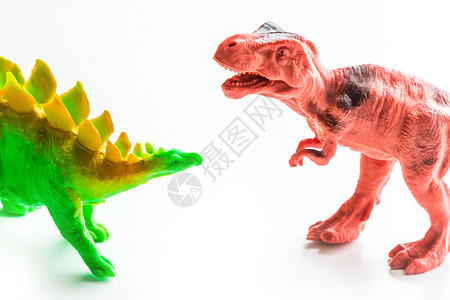 孤立的白色背景上恐龙玩具孤立的白色背景上小型恐龙玩具强的快乐捕食者图片