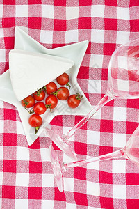 番茄产品羊皮纸餐桌布上的食物杯子紧闭着面巾上的食物杯子图片