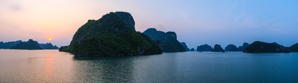 越南东亚哈隆湾日落的全景图休闲太阳海图片