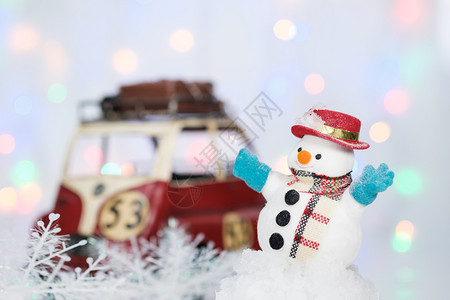 户外一个雪人打和装饰在bokoh背景的布基上复制季节欢迎圣诞快乐或新年的空间AF点选择可爱的节日图片