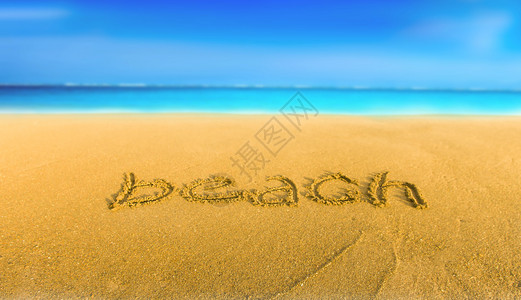 沙滩上的手写英文单词图片