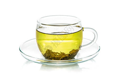 饮料透明玻璃杯天然绿色茶以白背景隔绝在特写中明亮的液体图片