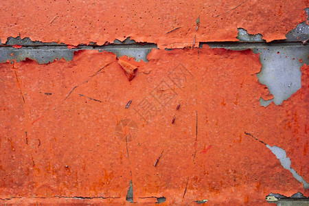 灰色的泥Grunge混凝土墙壁剥皮涂料旧的破碎墙桃或粉色彩贴近身的Grunge水泥墙壁磨面涂料旧的碎裂墙桃或粉红色彩优质的图片