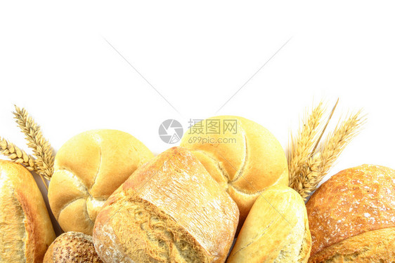 各种新鲜面包的顶部视图在白色背景上与复制空间隔开自农业美食图片