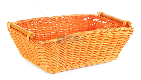 以白色背景隔离的橙木篮子编织单身的蔬菜图片