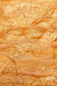 内部的热情颜色古橙黄大理石的异常发光质棕色对角裂缝和刮痕垂直形象用亮橙色和斜面裂缝涂出明亮橙色的紫状大理石质图片