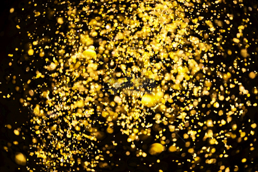 为了黄色的创辉生日结婚周年礼新前夕或圣诞节的彩色全模糊抽象背景摘要Glitter黄金bokehbokeh图片
