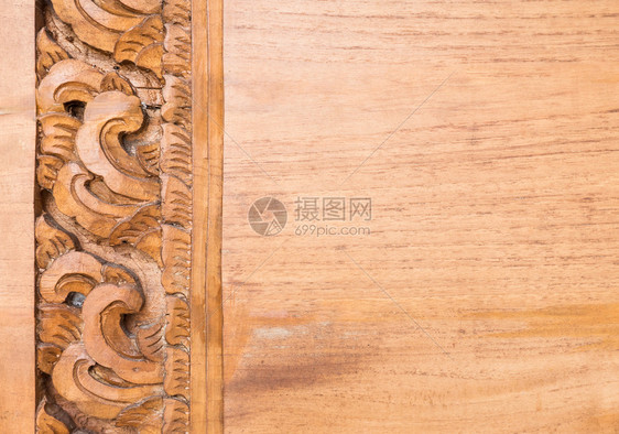 详细描述泰神庙茶叶板上雕刻的花架棕色抽象亚洲图片