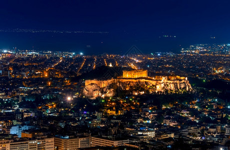 希腊雅典夏季夜城市和美术空中观摩雅典和夜间大都会日落城市景观大理石图片