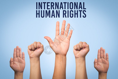 女表决统一国际人权日概念举手图片