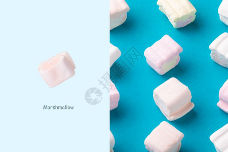 生日软糖乐趣由甜棉花糖制成的创意布局以蓝底背景图片