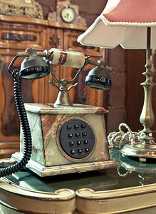 老式摄影机桌子沟通接收者上的老式传统古旧电话Name背景