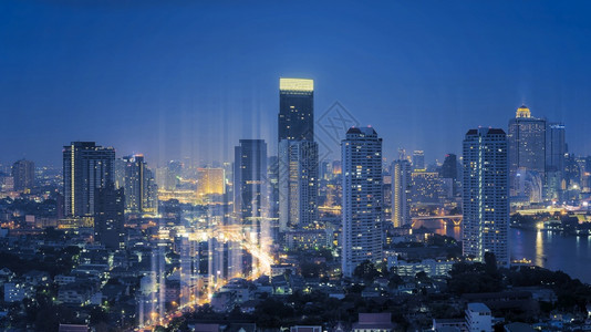 联网白色的夜视曼谷市风景现代城具有抽象无线网络连接概念通信技术和a现代化城市带有抽象的无线网络连接概念通信技术电图片