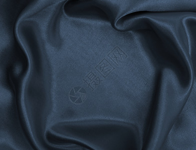 平滑优雅的深灰色丝绸或纹质可用作抽象背景面料的新材图片