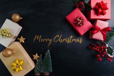 庆典圣诞快乐全盛礼物和黑色背景的装饰品夜晚图片