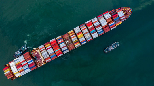 码头港口航运集装箱船载在进出口业务商物流和货运集装箱船输载货船空中顶视图图片