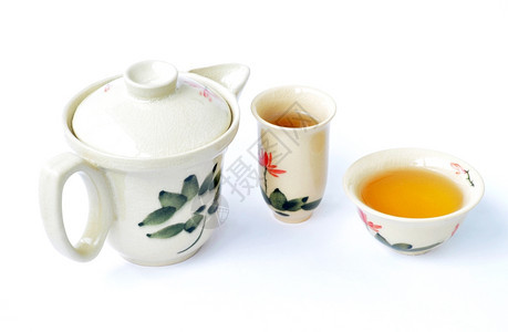 碗传统的白色背景茶叶饮料图片