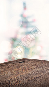 空角棕色木质表格其摘要为圣诞树装饰品淡光线模糊背景霍利日展示产品的模拟垂直横幅和在线介质广告169冬天房间在线的图片