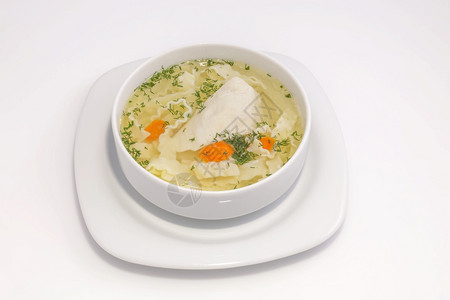 食物健康勺子简单鸡汤用白肉和面条关闭浅汤从上面看图片