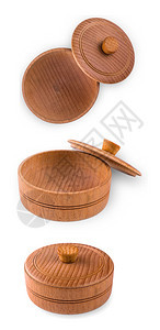 白色背景上隔着盖子的空木质碗一种烹饪棕色的图片