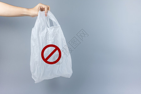 为了持有灰色塑料袋的男子其文字环境保护零废物可再使用不塑料世界环境日与地球概念具有复制空间的文本环境保护可重复使用Sayno塑料图片