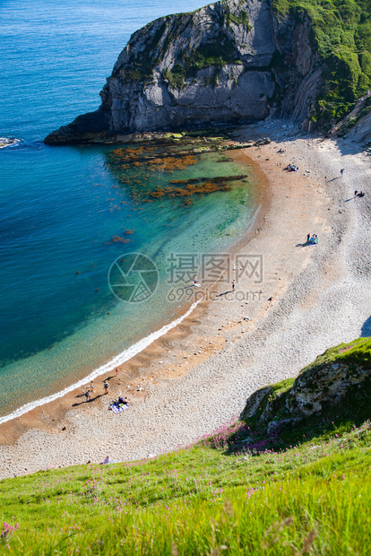 赛特海滩白色的英国夏日度假目的地DorsetJurassic海岸空中观察图片