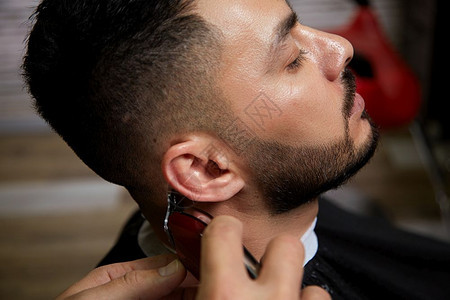 外貌这家伙是一个深色头发的亚洲印地安人出现在理发店影视形象上的剪发修饰整图片