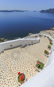 步风景希腊语美丽的一天在奥亚岛楼梯和火山希腊的楼梯和奥亚岛的火山图片