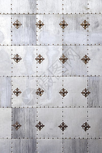 Gotthic金属墙一个装饰和保护的旧钢门细节床单墙纸行业图片