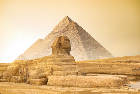 目的地历史墓吉萨大狮身人面像和金字塔日落时分埃及狮身人面像和金字塔日落时分图片