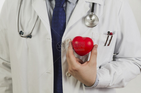 橡胶制服显示塑料心脏的医生诊所图片