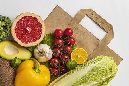 用纸袋包的蔬菜漂亮相光平板用纸袋包的菜类美丽平照板地用纸袋横幅健康成熟图片