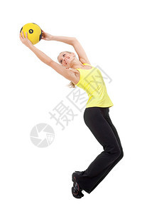 常设白种人与体型球相配的美貌丽年轻女青子她们用黄色和黑球锻炼女士图片