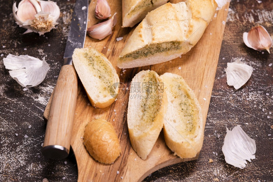 乡村特写美味的大蒜面包桌高分辨率照片特写美味的大蒜面包桌高质量照片热的绿色图片