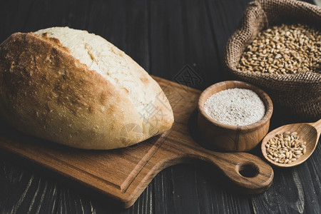 健康成分面包粉黑色的烤包机传统背景图片