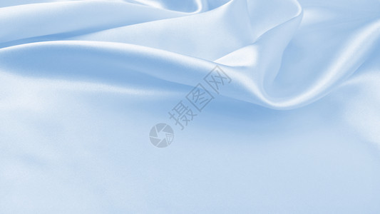 投标圣诞节平滑优雅的蓝色丝绸或席边奢华布质料可用作抽象背景本色设计新的图片