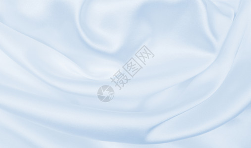 平滑优雅的蓝色丝绸或席边奢华布质料可用作抽象背景本色设计柔软的光滑时尚图片