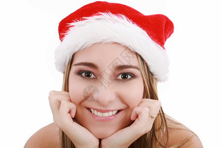 穿着圣塔帽的漂亮诞女孩照片在白色背景上被孤立地微笑着模型圣诞节人类图片