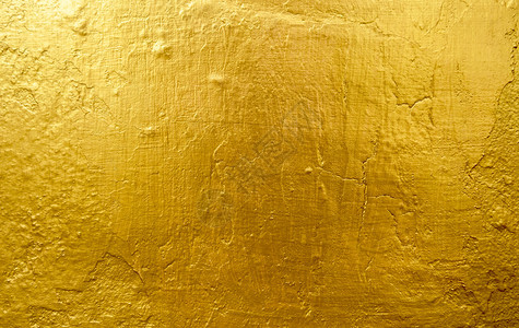 反光的青铜合金色背景或纹理和影子旧墙壁刮痕图片