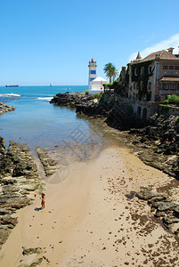 景观港口在葡萄牙卡斯凯Cascais的海滩和灯塔照片旅行图片